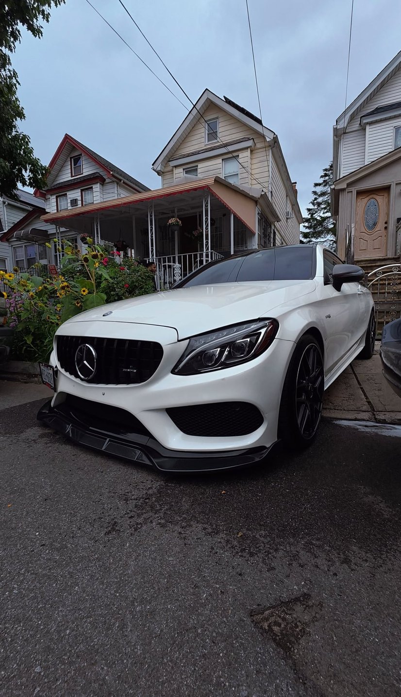 White Mercedes-Benz C-Class coupe after a full detail